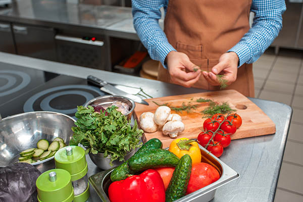 chef cooking in a restaurant kitchen