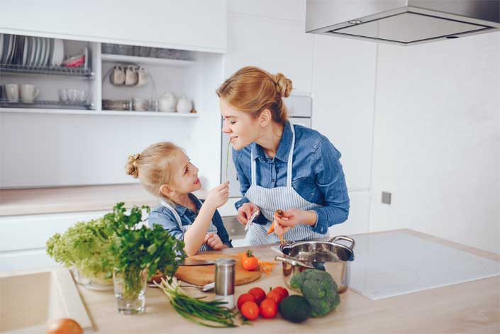 mother daughter cooking