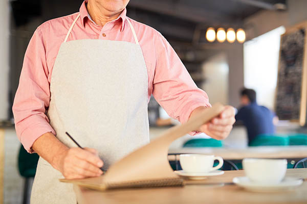 chef writing in a notepad