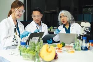 nutritionist in lab with food on the table