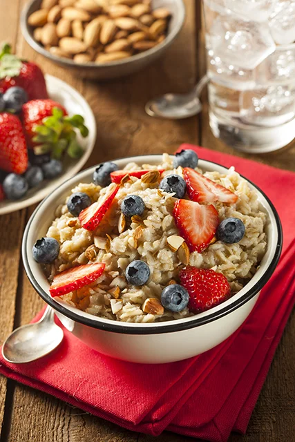 oatmeal with strawberries blueberries and almonds